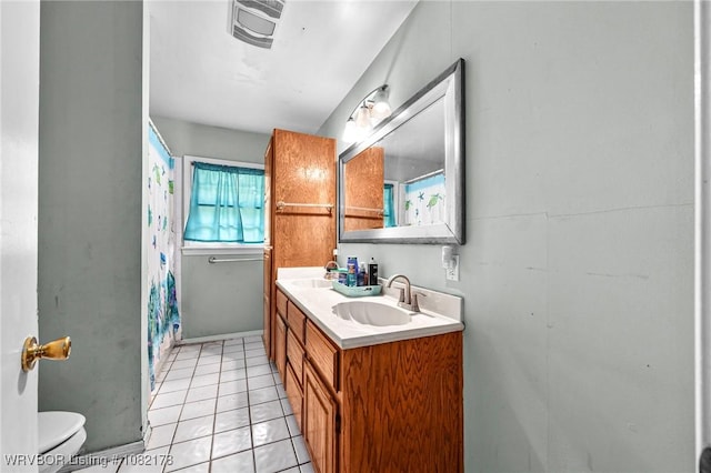 7 Bon Air St, Van Buren, AR 72956 - full bathroom featuring double vanity, tile patterned flooring, and a shower with curtain