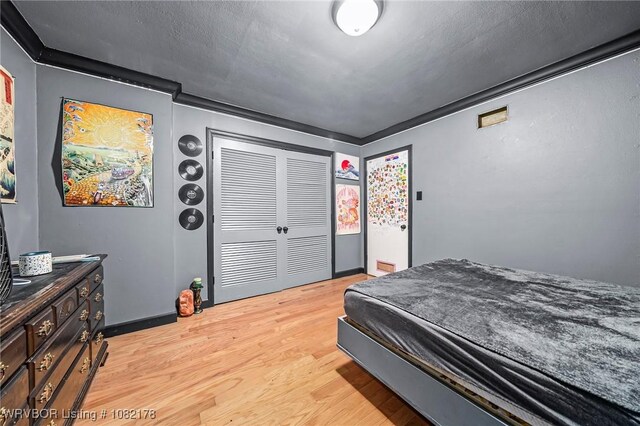 7 Bon Air St, Van Buren, AR 72956 - bedroom with light wood-type flooring and a closet