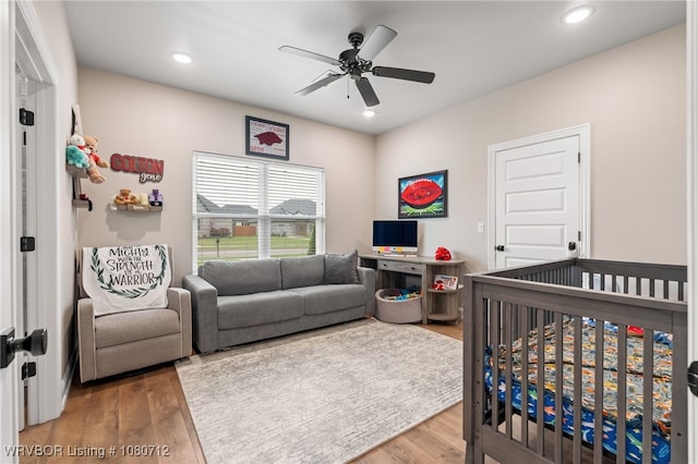 4100 Margate Dr, Fort Smith, AR 72903 - bedroom featuring recessed lighting, ceiling fan, wood finished floors, and a nursery area