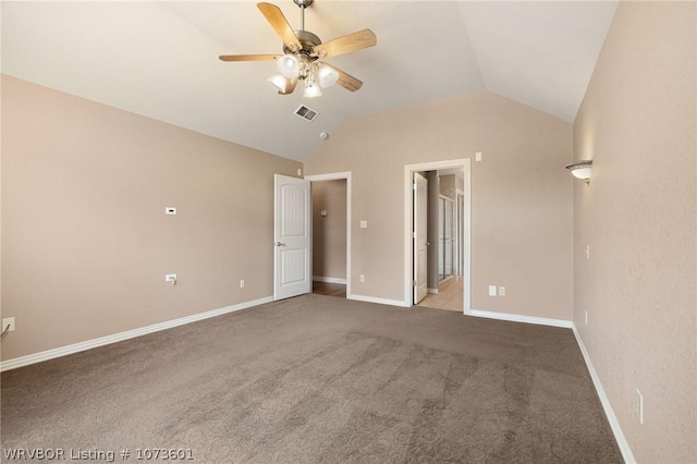 unfurnished bedroom with ceiling fan, lofted ceiling, carpet floors, and ensuite bath