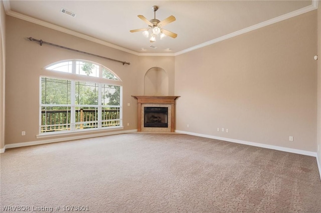 unfurnished living room with carpet, ceiling fan, and ornamental molding