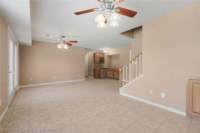 unfurnished room featuring ceiling fan