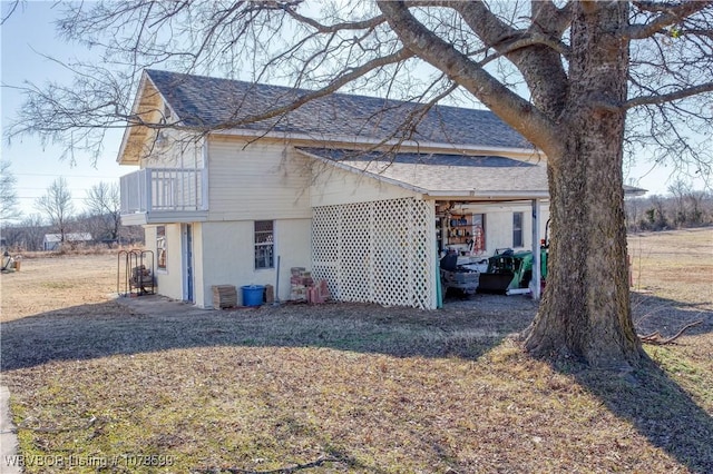 view of property exterior featuring a balcony