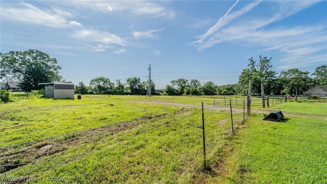 6562 Broadleaf Dr, Alma, AR 72921 - view of yard with a storage shed and a rural view