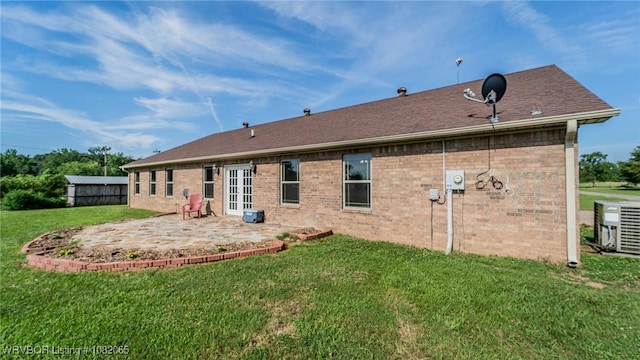 6562 Broadleaf Dr, Alma, AR 72921 - rear view of property with a yard, a patio, and brick siding