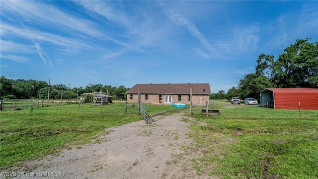 6562 Broadleaf Dr, Alma, AR 72921 - view of front of property with a detached carport and a rural view