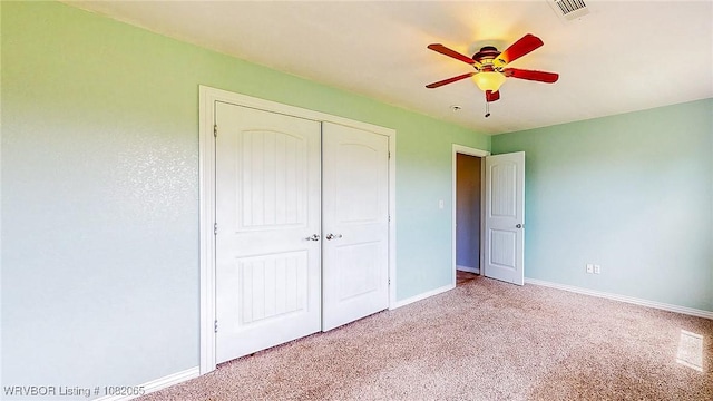 6562 Broadleaf Dr, Alma, AR 72921 - unfurnished bedroom with a closet, light colored carpet, and ceiling fan
