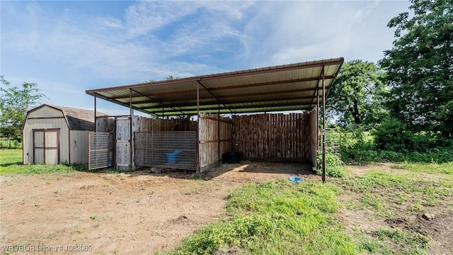 6562 Broadleaf Dr, Alma, AR 72921 - view of parking / parking lot featuring a detached carport