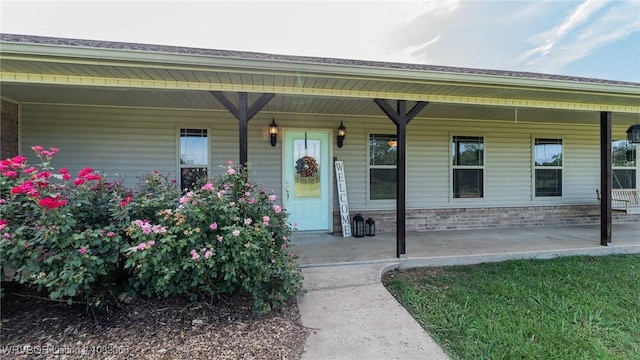 6562 Broadleaf Dr, Alma, AR 72921 - doorway to property featuring a porch