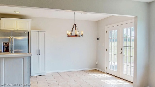 6562 Broadleaf Dr, Alma, AR 72921 - unfurnished dining area with french doors, a chandelier, and recessed lighting