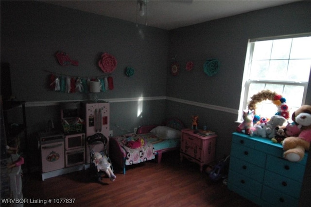 bedroom featuring hardwood / wood-style floors