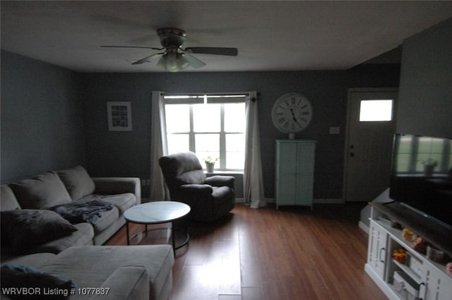 living room with ceiling fan and wood-type flooring