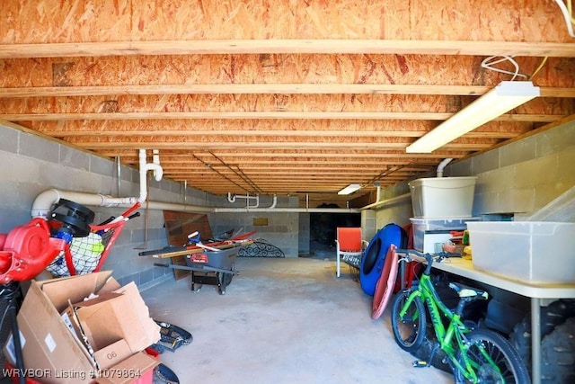 interior space featuring concrete block wall