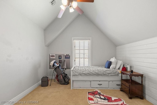 bedroom featuring ceiling fan, visible vents, vaulted ceiling, and light colored carpet