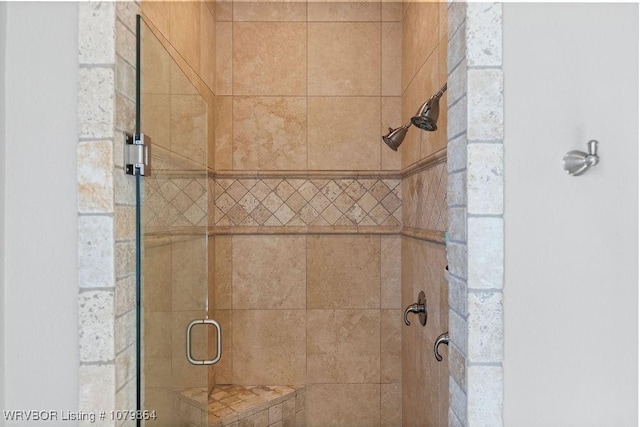 bathroom featuring a stall shower
