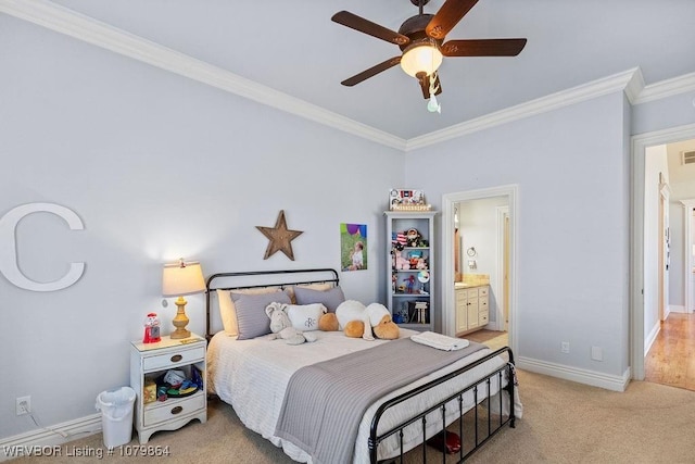 bedroom featuring connected bathroom, crown molding, light carpet, baseboards, and visible vents