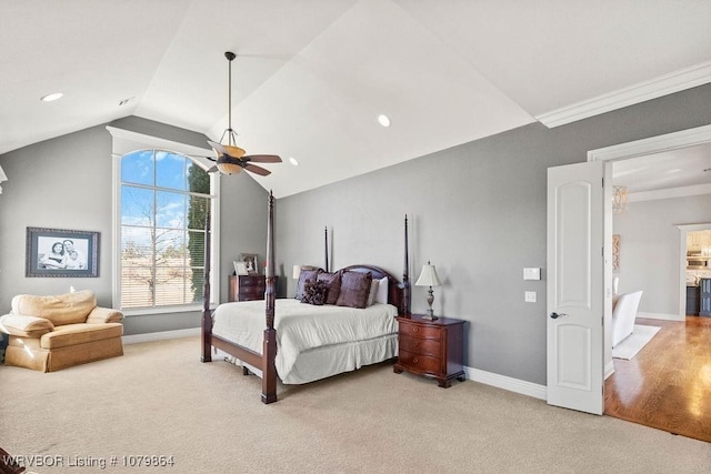 bedroom with baseboards, lofted ceiling, ceiling fan, and carpet