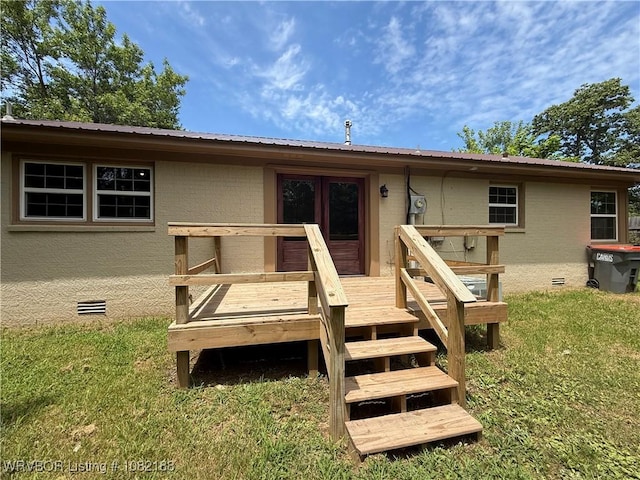 1505 E Main St, Lavaca, AR 72941 - back of property with crawl space, a deck, and a metal roof