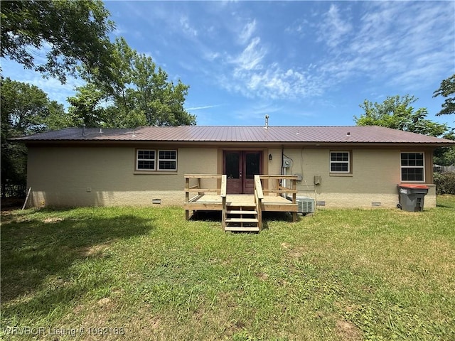 1505 E Main St, Lavaca, AR 72941 - back of property with crawl space, a deck, a yard, and french doors