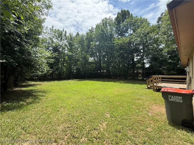 1505 E Main St, Lavaca, AR 72941 - view of green lawn featuring a deck