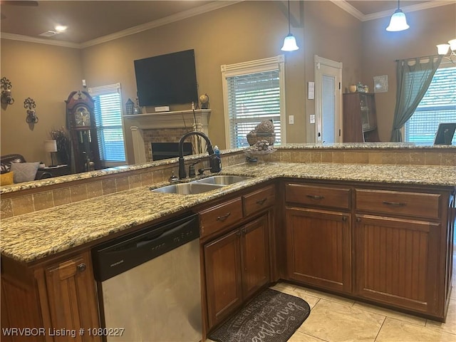 304 Caseys Ct, Lavaca, AR 72941 - kitchen with stainless steel dishwasher, a wealth of natural light, a brick fireplace, and a sink