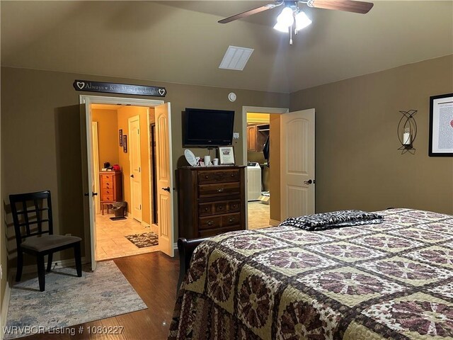 304 Caseys Ct, Lavaca, AR 72941 - bedroom with wood finished floors and ceiling fan