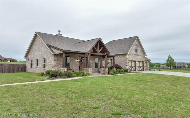 view of front facade featuring a front lawn and a garage