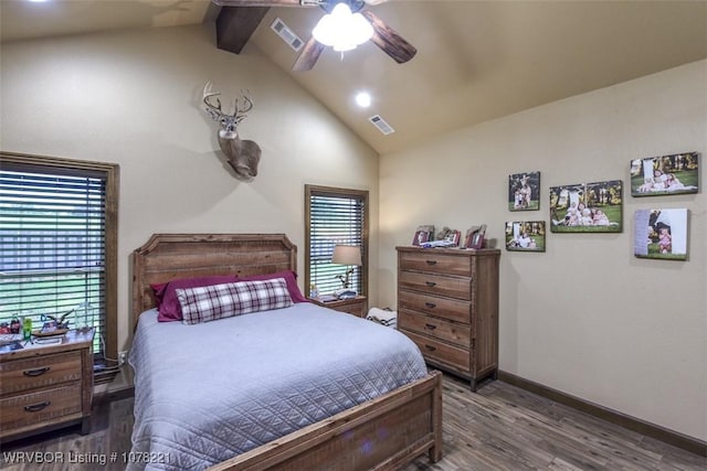 bedroom with dark hardwood / wood-style flooring, lofted ceiling with beams, and ceiling fan