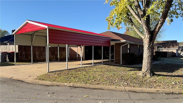 view of front of home featuring a carport