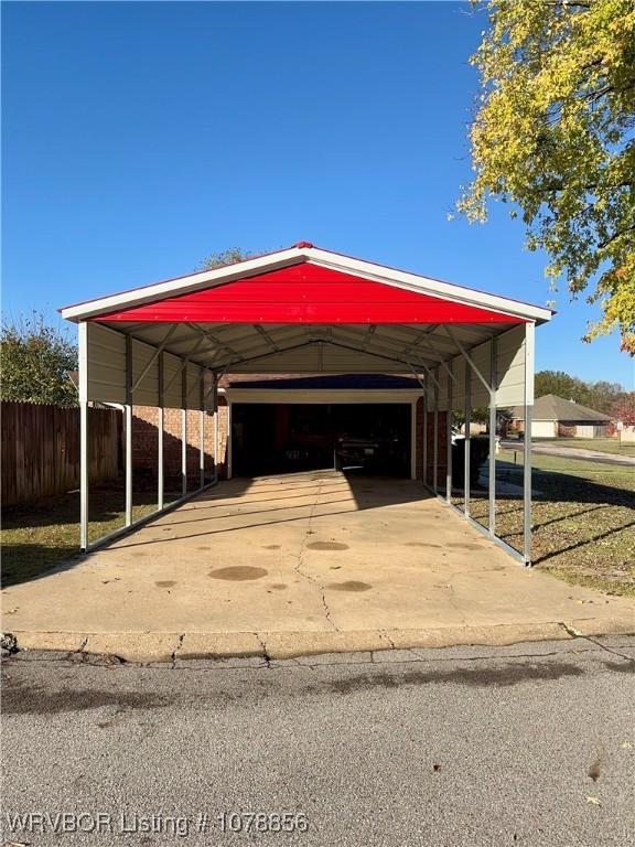 exterior space featuring a carport