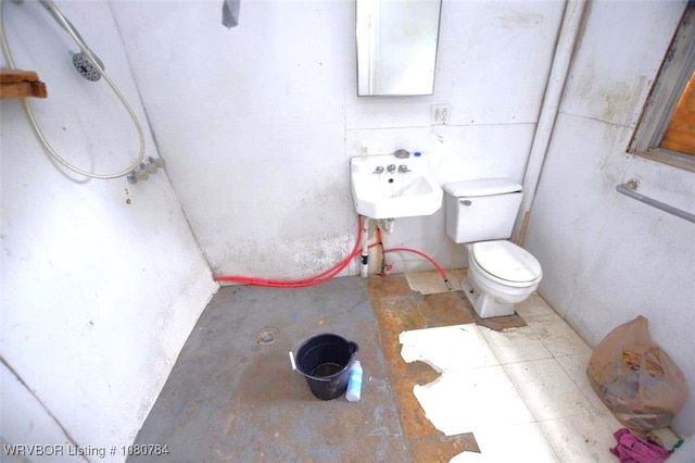 bathroom featuring a sink and toilet