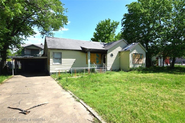 single story home featuring concrete driveway and a front yard