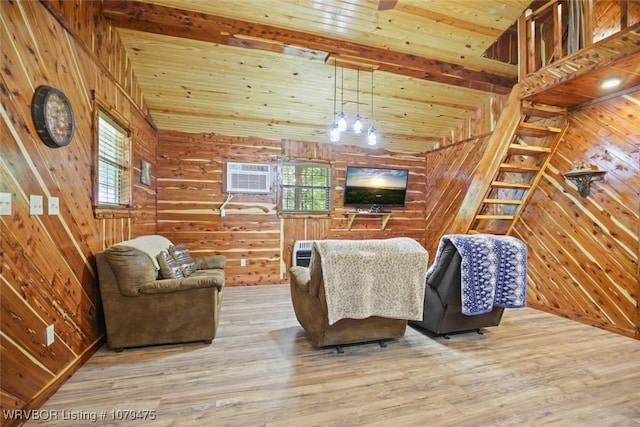 living room featuring wooden walls, wood finished floors, and wooden ceiling