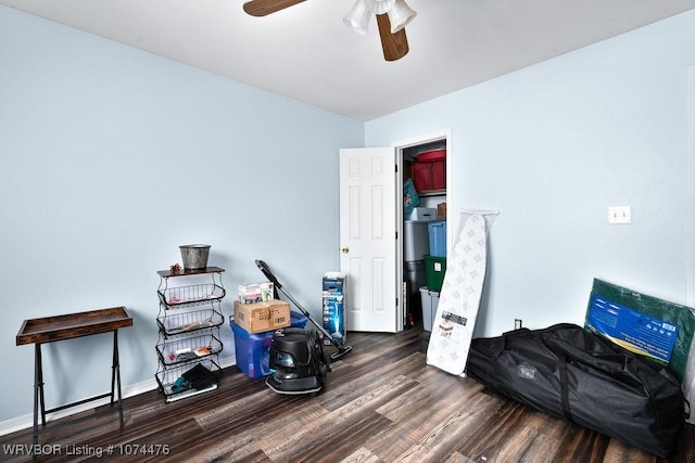 interior space featuring dark hardwood / wood-style floors and ceiling fan