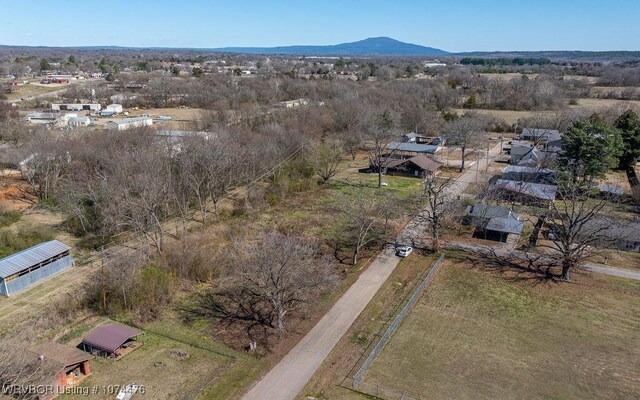 birds eye view of property featuring a mountain view