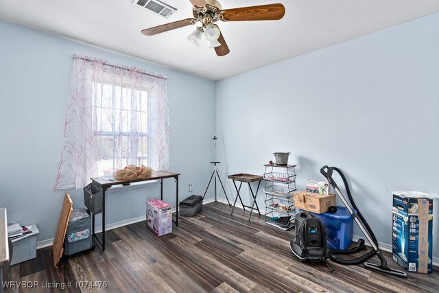 miscellaneous room with dark hardwood / wood-style floors and ceiling fan