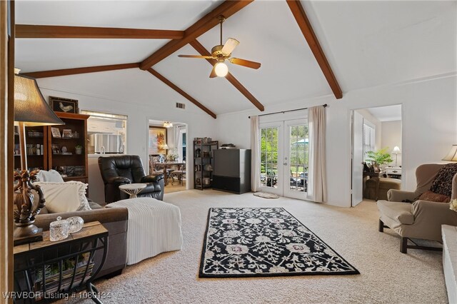 3032 King Dr, Mulberry, AR 72947 - carpeted living area with a ceiling fan, french doors, and vaulted ceiling with beams