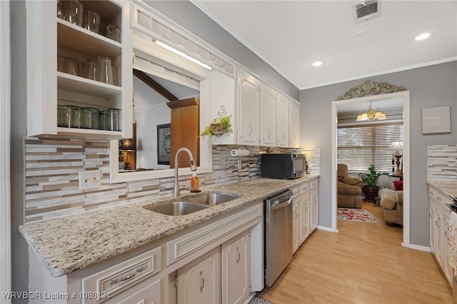 3032 King Dr, Mulberry, AR 72947 - kitchen featuring visible vents, dishwasher, a sink, black microwave, and backsplash