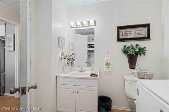 3032 King Dr, Mulberry, AR 72947 - bathroom featuring vanity, crown molding, and toilet