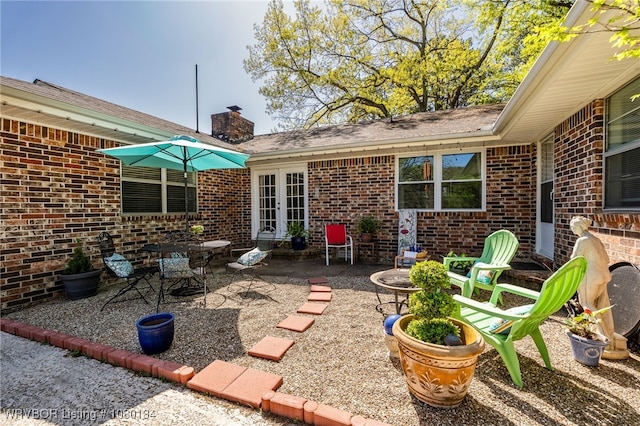 3032 King Dr, Mulberry, AR 72947 - view of patio with french doors