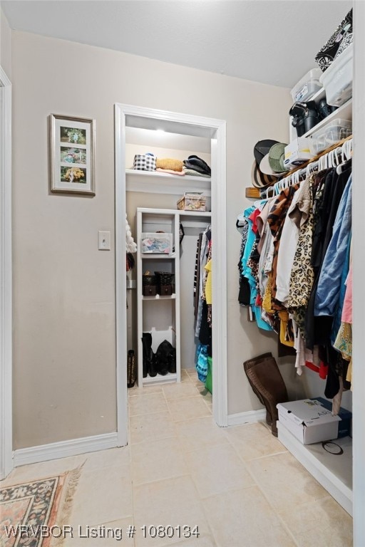 3032 King Dr, Mulberry, AR 72947 - spacious closet featuring tile patterned floors