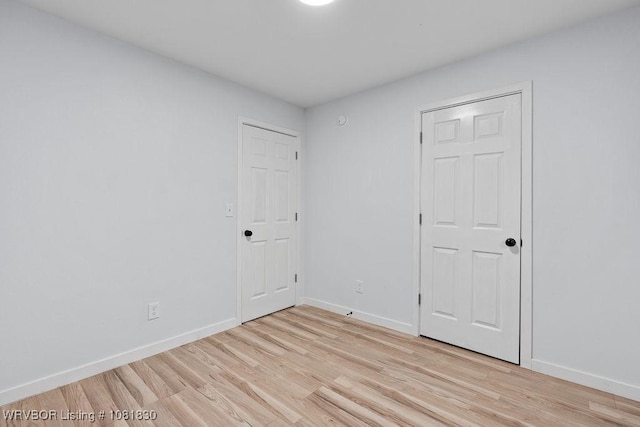 2420 Independence St, Fort Smith, AR 72901 - unfurnished bedroom with light wood-type flooring and baseboards