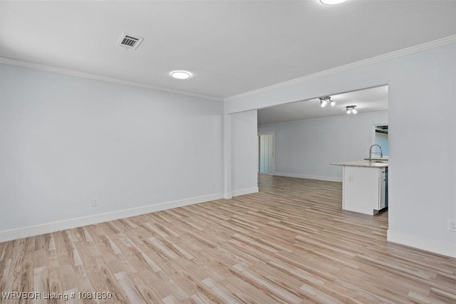 2420 Independence St, Fort Smith, AR 72901 - empty room featuring ornamental molding and light wood-style floors