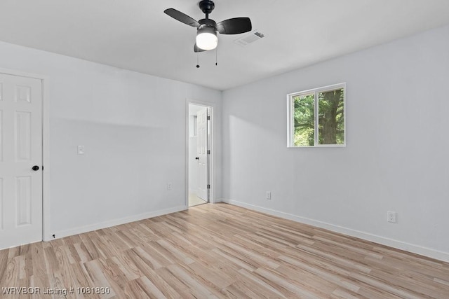 2420 Independence St, Fort Smith, AR 72901 - empty room with light wood-style flooring and ceiling fan