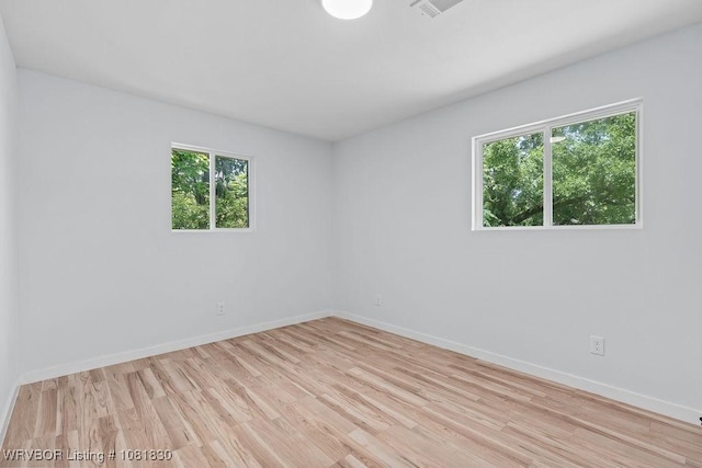 2420 Independence St, Fort Smith, AR 72901 - unfurnished room with healthy amount of natural light and light wood finished floors