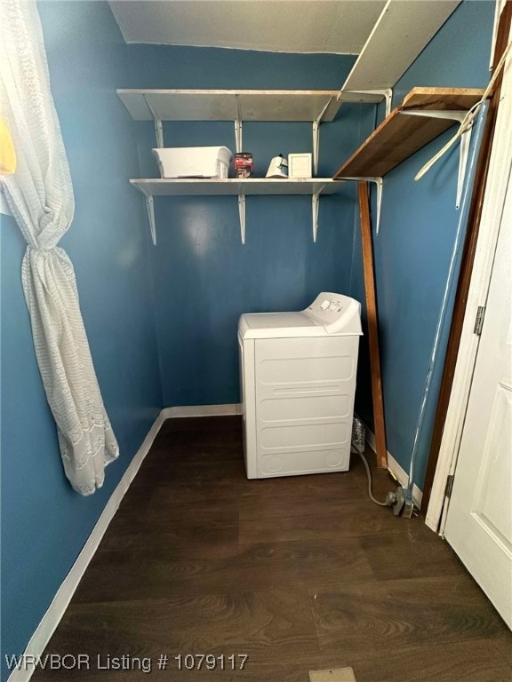 washroom with laundry area, dark wood-style flooring, and baseboards