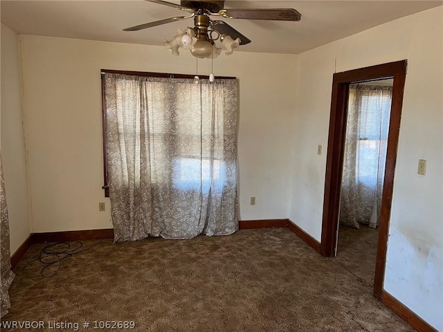 carpeted empty room with ceiling fan