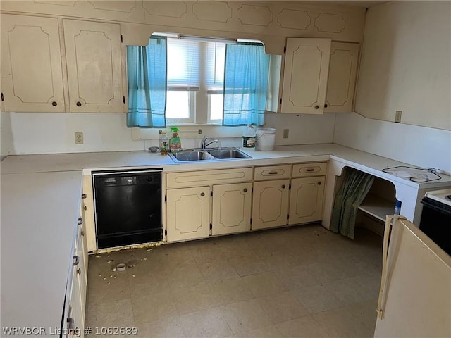 kitchen featuring sink and black dishwasher