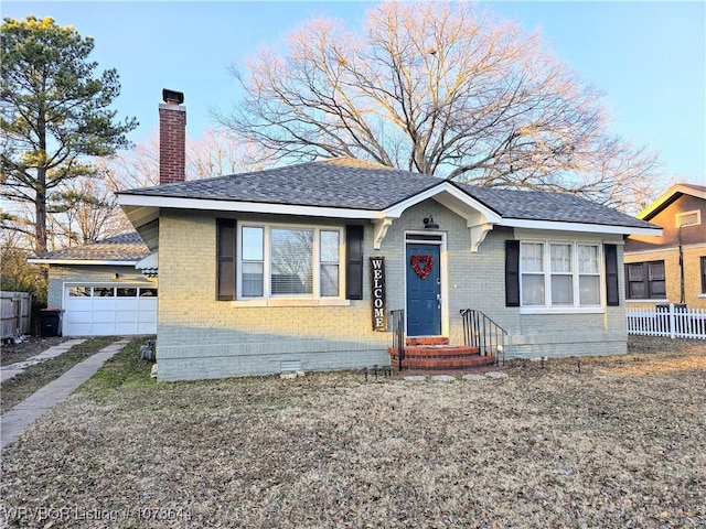 view of front of home with a garage