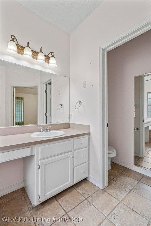 330 Northridge Dr, Van Buren, AR 72956 - bathroom with vanity, toilet, and baseboards
